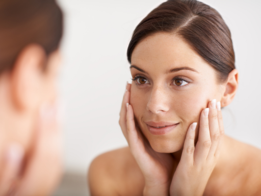 A woman with smoother skin after using a retinol product